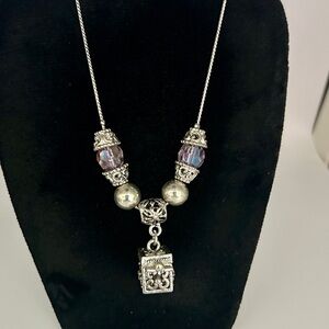 Elegant Silver Necklace with Purple Accents​​​​​​​